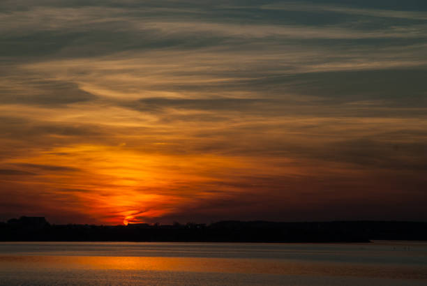 istock beautiful sunset sky over bucharest lake lacul morii 664572594