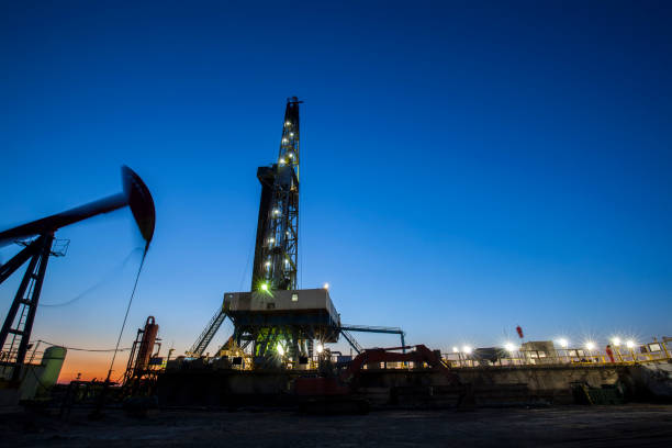 istock Oilfield derrick 664575826