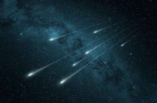 밤 하늘에서 유성우 - asteroid stock illustrations
