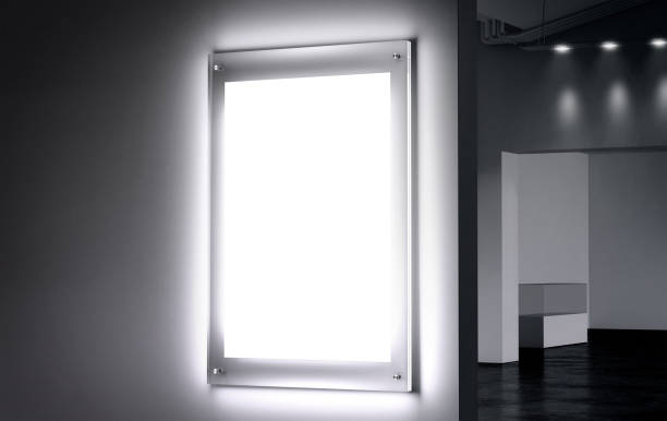istock Blank white illuminated poster mock up in dark hall 664588046