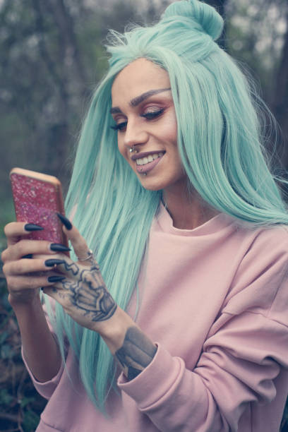 istock Girl with mint wig outdoor. 664599634