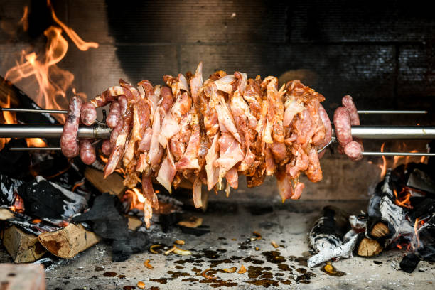 istock Making home made cag kebab gyros with fire and charcoal. 664599878