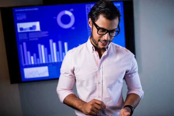 istock Businessman pretending to use a smartphone 664602308