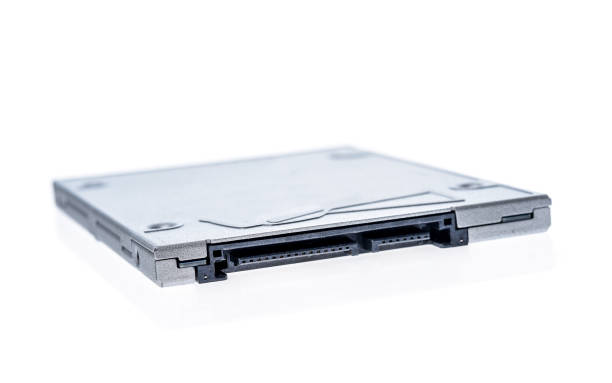 Solid state drive SSD isolated on white background. Solid state drive SSD isolated on white background. SATA - data and electricity connectors view, shallow depth of field. solid state disk photos stock pictures, royalty-free photos & images