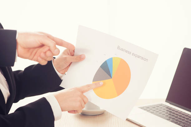 istock Business people during paperwork at meeting 664603436