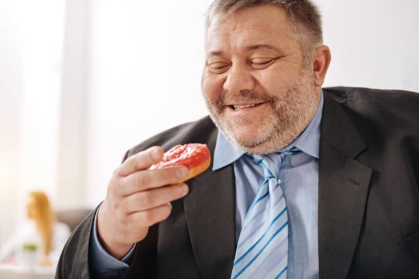 istock Delighted hungry worker happy to have some sweets 664603896