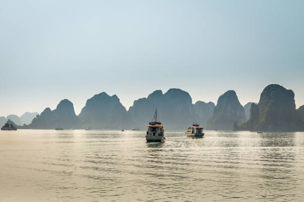istock Cruising in Halong Bay, Vietnam 664606428