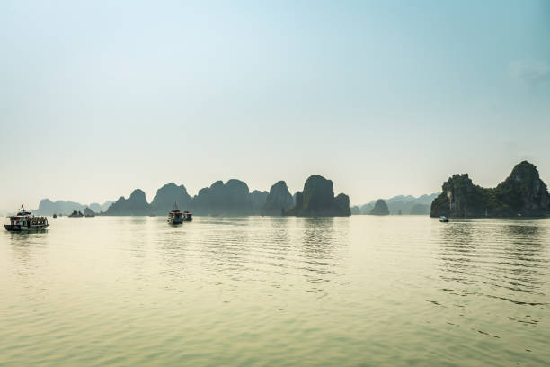 istock Cruising in Halong Bay, Vietnam 664608022