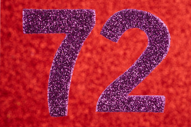 istock Number seventy-two purple color over a red background. Anniversary. 664614238