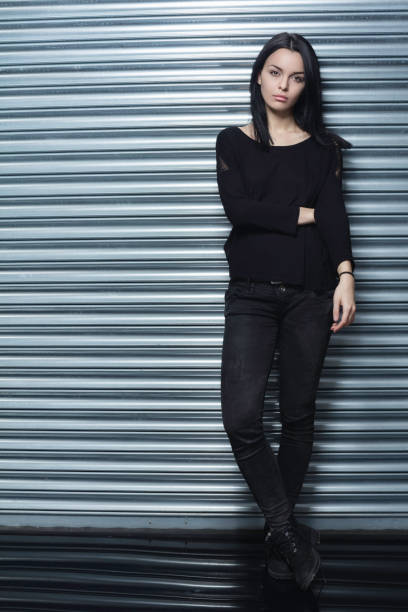 istock Casual girl dressed in black 664614260