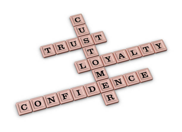 trust, loyalty, confidence and customer crossword puzzle. - in gold we trust imagens e fotografias de stock