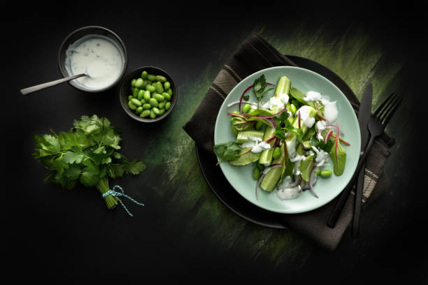 Salads: Salad with Cucumber, Lettuce, Soybeans, Parsley and Yoghurt Dressing