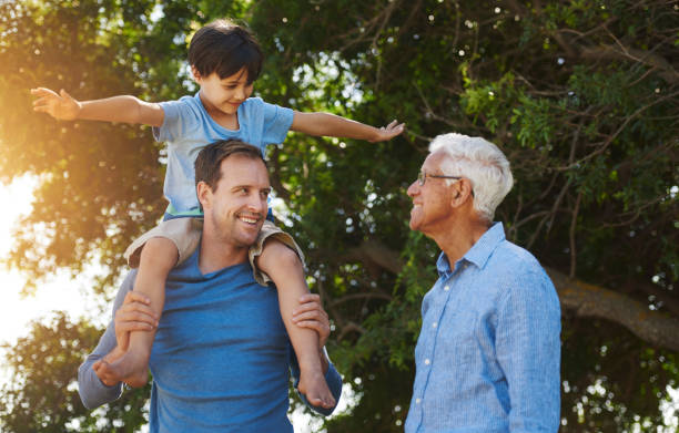 istock Can I get a piggyback from you, grandpa? 664615362