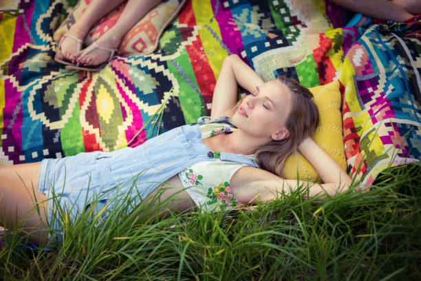 Teenage girl is sleeping in bed. Vintage home photo