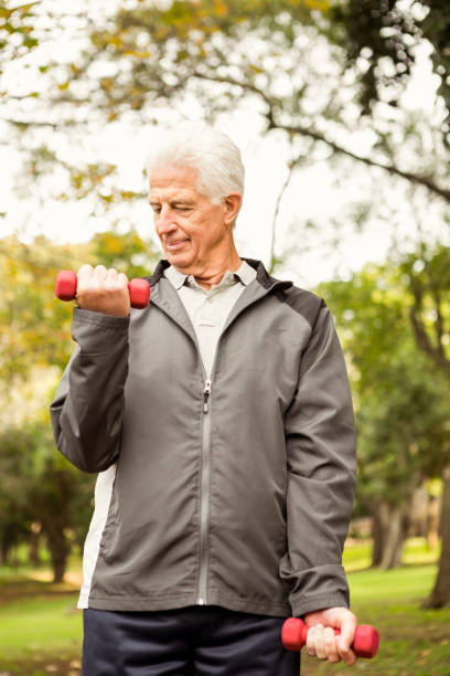 istock Senior man working out in park 664618400