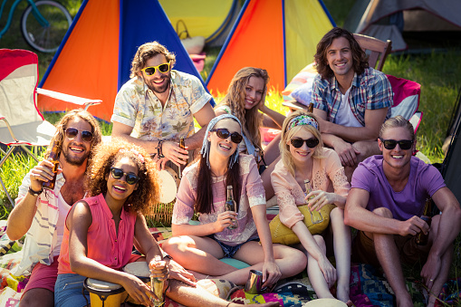 Group Fun Website Group Of Friends Having Fun Together At Campsite Stock Photo - Download ...