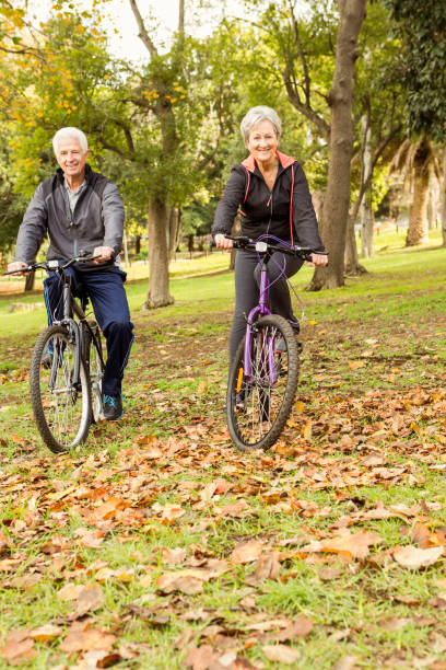 istock Senior couple in the park 664619196