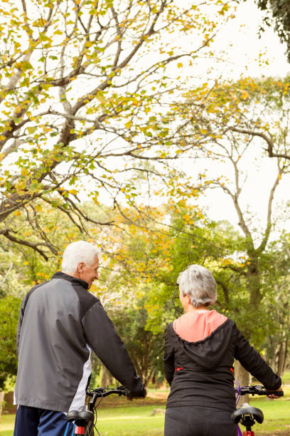 istock Senior couple in the park 664619356
