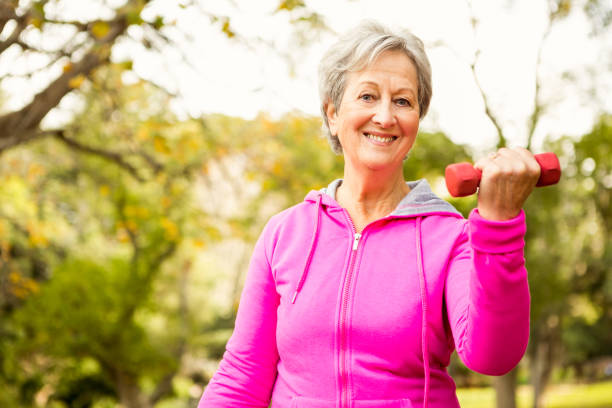 istock Senior woman in the park 664619746