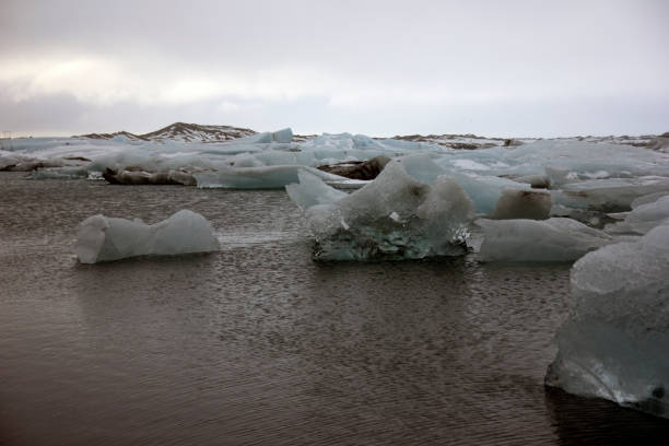 istock Blue icebergs floating in the lagoon 664619848