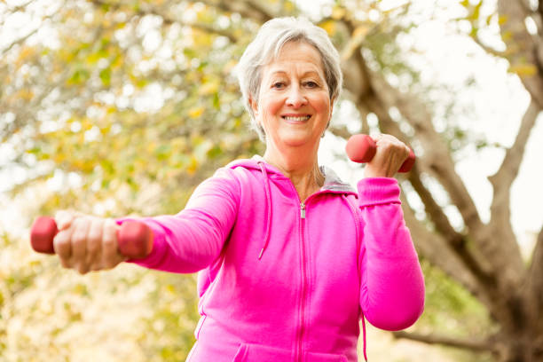 istock Senior woman in the park 664619892
