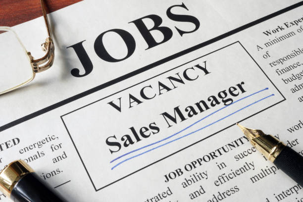 istock Newspaper with ads for vacancy sales manager. 664627340
