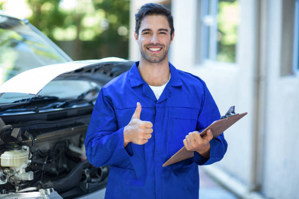 Portrait of confident engineer showing thumbs up
