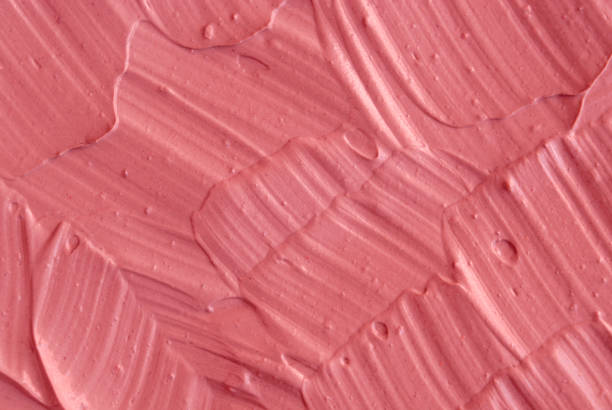 istock Pink cosmetic clay (facial mask, cream) texture close up, selective focus. Abstract background 664638016