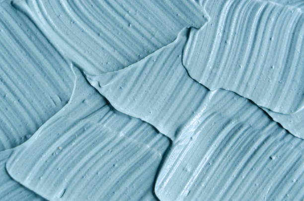 istock Blue cambrian cosmetic clay (facial mask, cream) texture close up, selective focus. Abstract background. 664638188