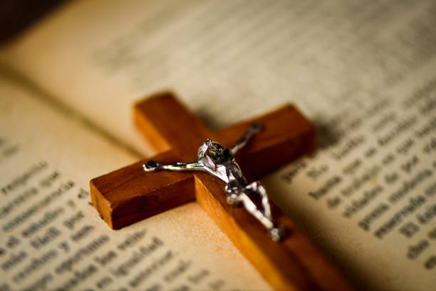 istock old christian crucifix on a bible 664639042