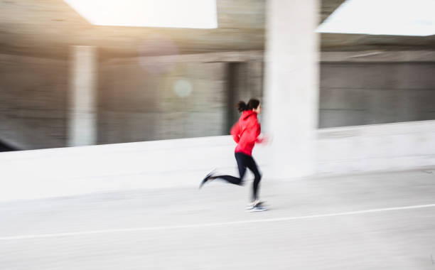 istock Female Athlete Warming up Outdoors 664639808