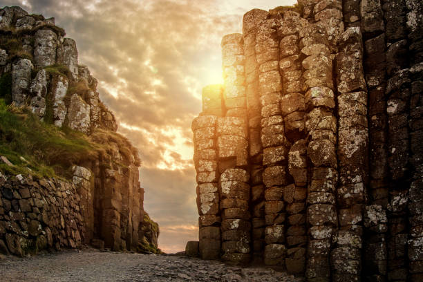 Sunset at Giant's causeway in Northern Ireland Sunset at Giant's causeway in Northern Ireland giants causeway photos stock pictures, royalty-free photos & images