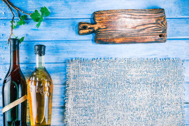 istock Blue wood background with wine theme 664642144
