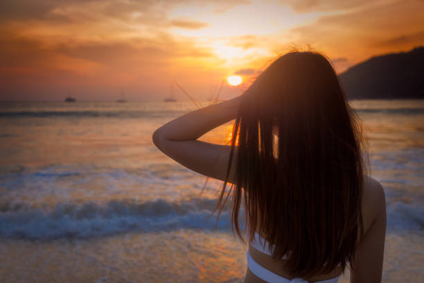 istock Young asia woman with white bikini 664649516