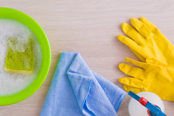 istock Microfiber rag, sponge, rubber gloves and other window cleaning equipment. 664653398