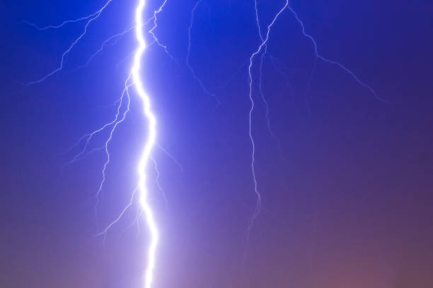 istock Dramatic thunder storm lighting bolt over the sky, god power 664661118