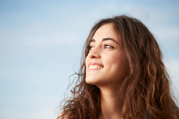 istock pretty girl in the park 664664160