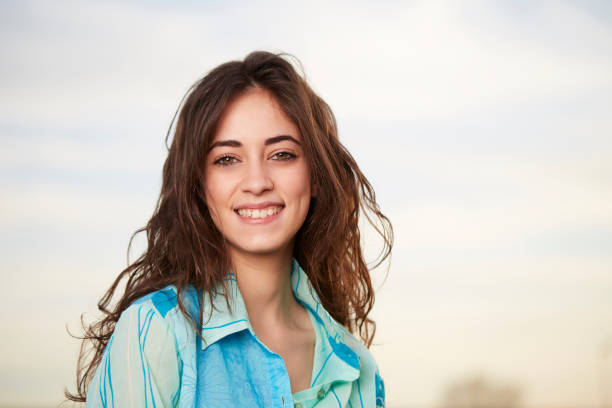 istock pretty girl in the park 664664398
