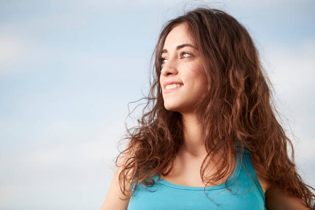 istock pretty girl in the park 664664452