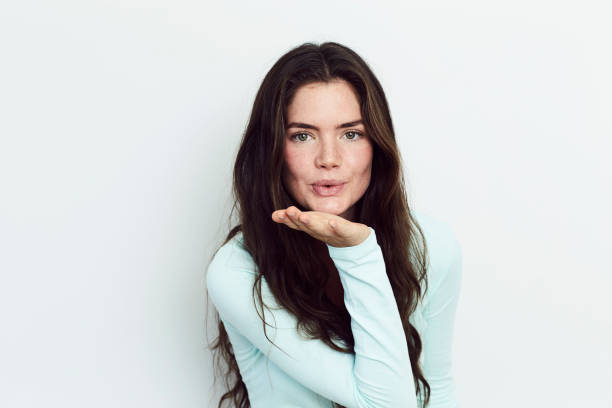 istock Blowing kiss beauty 664664474