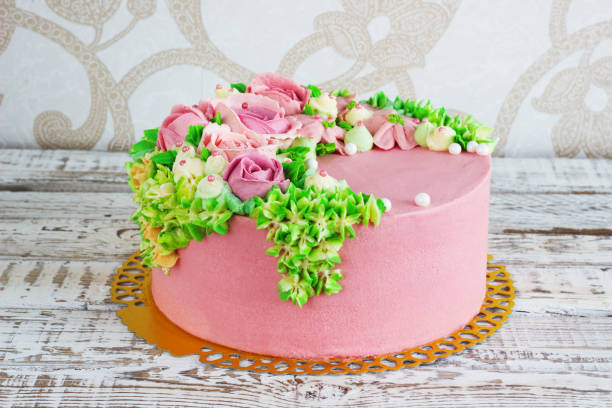 istock Birthday cake with flowers rose on white background 664664776