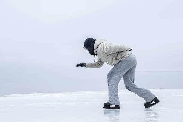 istock Man skating and training with black skatess. Weekends activities outdoor. 664668778