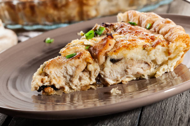 istock Tart with chicken, mushrooms and cheese 664669358