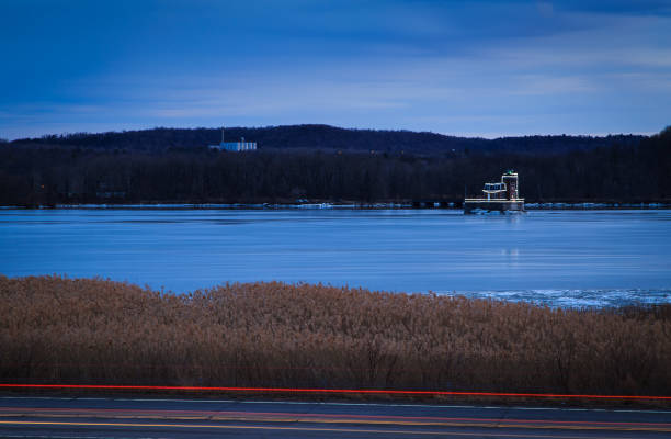 istock Athens NY lighthouse across western Hudson River in winter 664676132