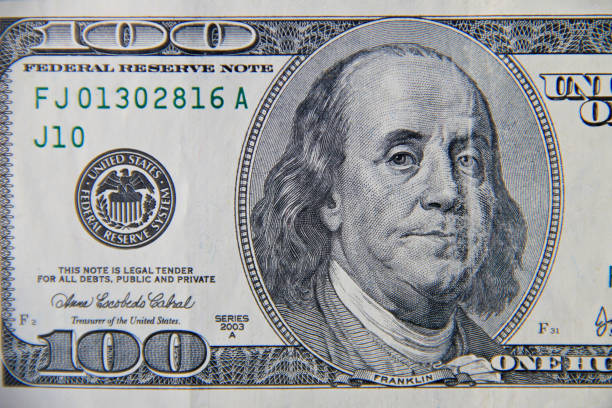 istock Macro shot of one hundred dollars bill 664680104