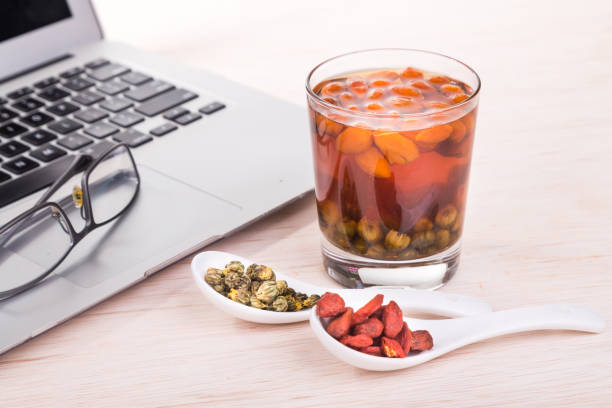 goji berries or wolfberry, chrysanthemum tea remedy to improve eyesight - berry wolfberry berry fruit chinese medicine imagens e fotografias de stock