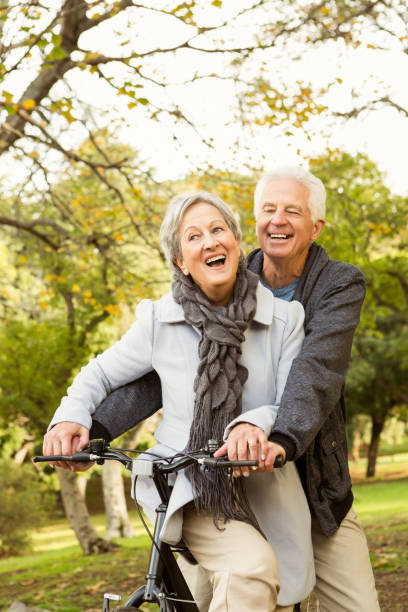 istock Senior couple in the park 664712040
