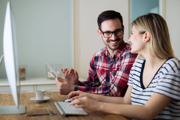 istock Couple with ideas working from home on sturtup product 664712876
