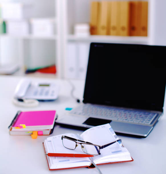 istock Group of multicolored office folders and glasses 664712998
