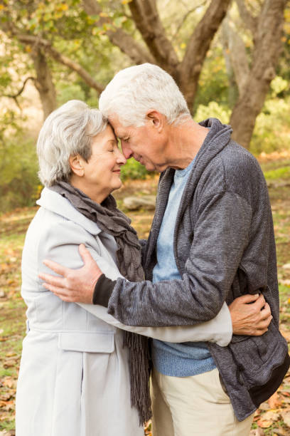 istock Senior couple in the park 664716178